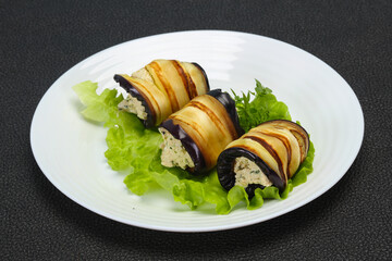 Stuffed eggplant roll with cheese and herbs