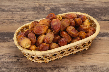 Sweet tasty dry dates in the basket