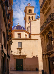 View from Saint Joseph street of the tower of the Sant Nicalau de Bari Co-Cathedral.  Alicante Spain