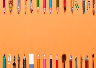 School stationery and space for text on a colorful background. The view from the top.