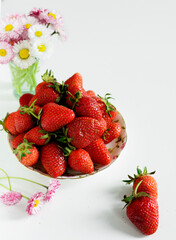 Strawberry in the bowl, white background