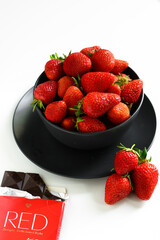 Strawberry in the bowl, white background