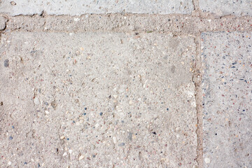 Texture of Old paving slabs. on a pavement sidewalk