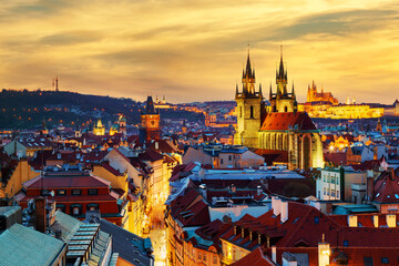 Obraz premium Amazing cityscape view of Prague Castle and church of our Lady Tyn, Czech Republic during sunset time. View from powder tower. World famous landmarks in Europe.