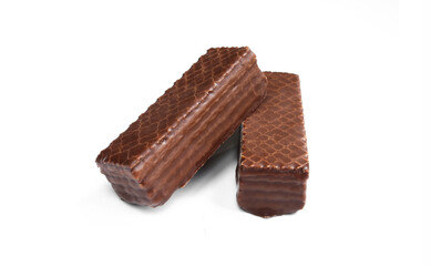 Two chocolate coated wafers isolated on white background. Tasty dessert