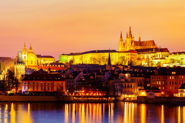 View of Prague Castle and Vltava river in Prague, Czech Republic during sunset time. World famous landmark in Europe.