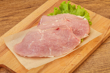 Raw pork steak for cooking