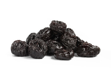 Pile of delicious prunes isolated on white background. Dried fruit