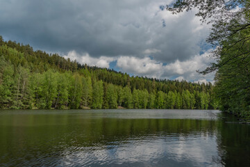 Fototapeta na wymiar Bily Halstrov reservoir in west Bohemia in spring sunny fresh day