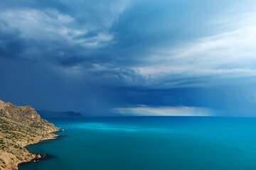 Obraz premium Thunderstorm and rain are coming to the sea coast of Crimea