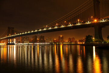 Fototapeta na wymiar manhattan nyc bridge at night