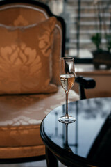 bar counter in restaurant. one glass of champagne is on the table