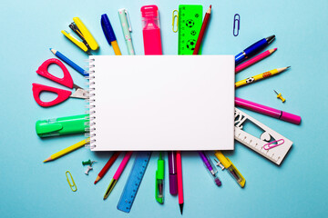 School notebook and various stationery. Back to school concept.