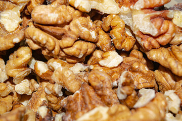 Peeled walnuts close-up. Surface texture. Healthy diet.