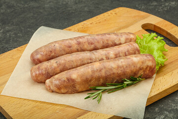 Raw pork meat sausages for grill