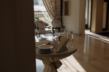 interior of a restaurant. glasses with champagne.