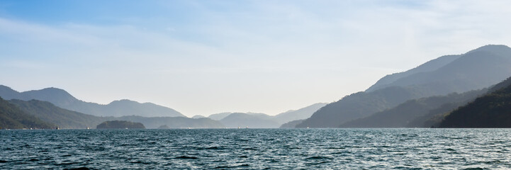 Saco do Mamangua, a tropical fiord in Paraty, Rio de Janeiro, Brazil. Web banner in panoramic view.