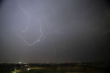 intense lightning lighting up the sky