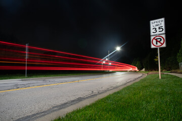 light trail streaking behind a car