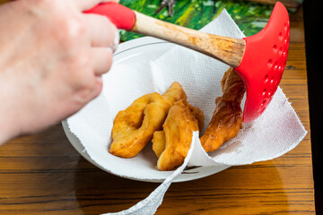 home furnishings. Kitchen. A child from the dough makes cookies. Brushwood. Close-up