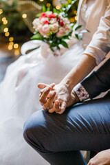 Married couple holding hands during ceremony