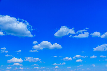 White fluffy clouds in the blue sky