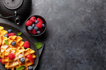 Delicious belgian waffles with summer berries