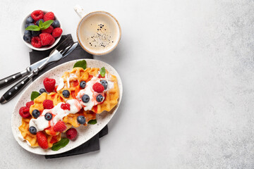 Delicious belgian waffles with summer berries
