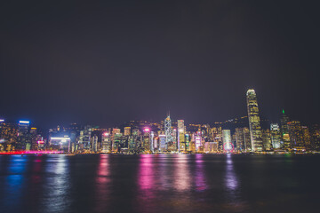 Fototapeta premium Hong Kong Skyscrapers Reflecting Off the Water at Night