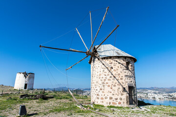 old windmills located in the bodrum of the high hill in Turkey.