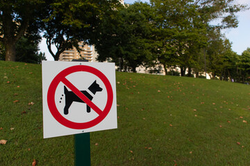 Sign of prohibition of dog excrement in a park