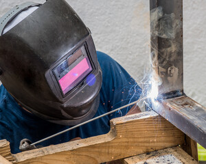 welding iron with rod welder freelance work