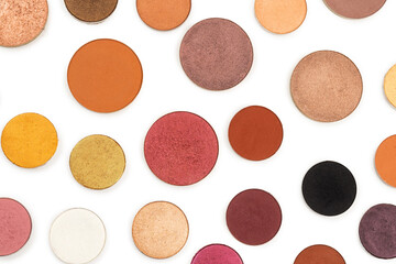 Round multicolored make up eyeshadows isolated on white.