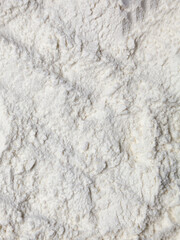 Background with white flour. Macro