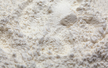 Scattered white flour. Background. Macro