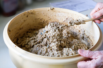 Preparation of bread dough in a bowl.