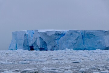 Closeup of blue iceberg at edge of pack ice in antarctic ocean, Antarctica © HWL Photos