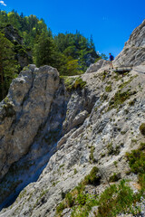 Young Man Walks On Rocky Hiking Trail In Ötschergräben In Austria