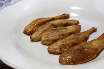 Fried eggplant on the white plate