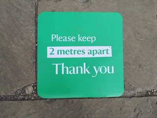 Please keep 2 metres apart sign