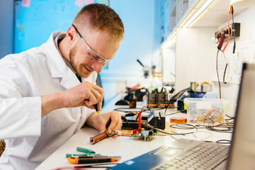 Man working in electronic workshop