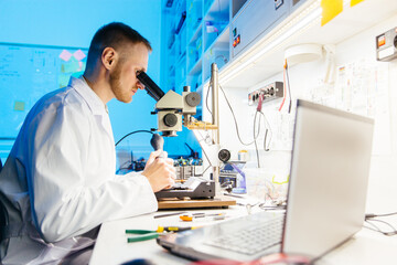 Man working in electronic research workshop