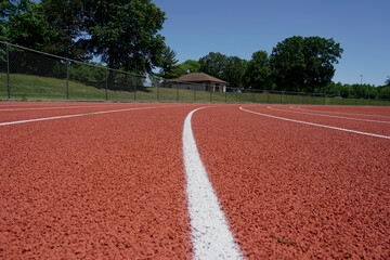 Close up of lines on the tarmac of a track and field sports center