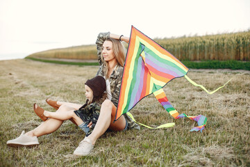 Mother with daughter. Kite with family.