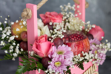 a wonderful gift of fresh berries and fruits and flowers