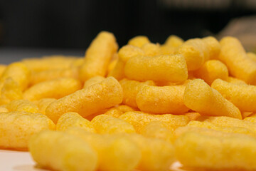 Corn sticks close-up white background