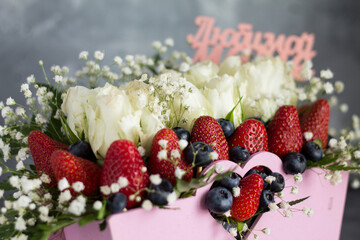 a wonderful gift of fresh berries and flowers