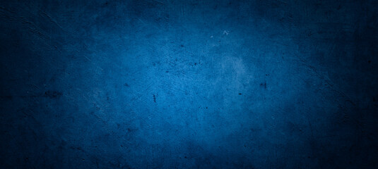 Naklejka premium Blue textured concrete wall background. Dark edges