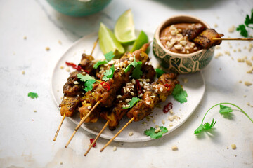 Thai chicken satay with peanut sauce.selective focus