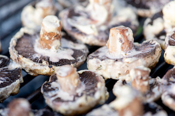 appetizing tasty fried mushrooms on the grid 